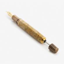 Load image into Gallery viewer, Angled view of the Visconti Il Magnifico Egyptian Marble Fountain Pen without the cap on. The piston lever is pulled.