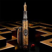 Load image into Gallery viewer, Decorative fountain pen with intricate maze design on a dark background.