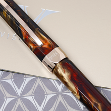 Load image into Gallery viewer, Close up to the cap ring. The engraving on it reads "OPERA"