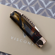 Load image into Gallery viewer, Close up to the side of the cap.