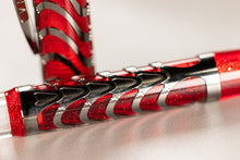 Load image into Gallery viewer, Close up to the skeleton of the Visconti Skeleton Ruby Red Fountain Pen. This section has a design similar to a skeleton spine.