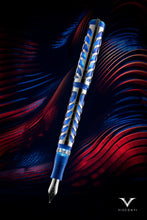 Load image into Gallery viewer, Front view of the Visconti skeleton Sapphire Blue Fountain Pen on a blue and red wave lines background.