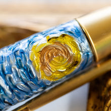 Load image into Gallery viewer, Close up to one of the painted moon's on the side of the cap.