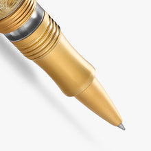 Load image into Gallery viewer, Close up to the Rollerball tip of the pen. The accents are gold colored.