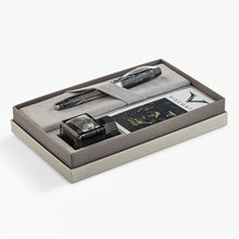 Load image into Gallery viewer, Angled view of the fountain pen and ink bottle in their presentation box slots.