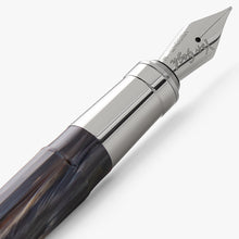 Load image into Gallery viewer, Close Up to the grip section and Fountain Pen nib on a white background. The nib has an engraving with Van Gogh's signature, and the text Visconti, M