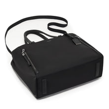 Load image into Gallery viewer, Angled bottom panel view of the bag, showing two thin leather feet.