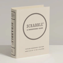 Load image into Gallery viewer, Angled front cover view of the book-shaped Scrabble packaging.