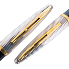 Load image into Gallery viewer, Close up to the ballpoint and pencil set clips. The top halves are silver with gold plated clips and trims.