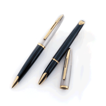 Load image into Gallery viewer, Front view of the ballpoint pen and mechanical pencil. The pen has the cap removed and placed to the side.