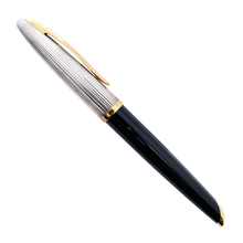 Load image into Gallery viewer, Side view o the ballpoint pen. The cap is silver plated with a gold-plated clip and cap-ring. the barrel is black lacquer with gold-plated trims.