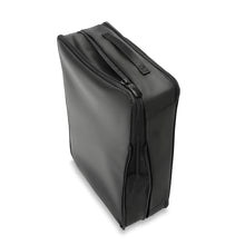 Load image into Gallery viewer, Briggs & Riley Check-In Packing Cube Set - Black
Briggs & Riley Check-In Packing Cube.  Showing Large Cube in process of zipping into the fully compressed position.
Small cube: 8.5 x 6.5 x 3 in / 21.6 x 16.5 x 7.6 cm
Medium cube: 13 x 8.5 x 3 in / 33 x 21.6 x 7.6 cm
Large cube: 17 x 13 x 3 in / 43.2 x 21.6 x 7.6 cm