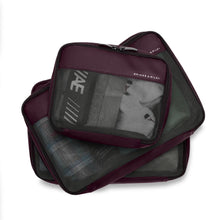 Load image into Gallery viewer, Set of three purple packing cubes with mesh fabric, stacked on a white background.