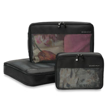 Load image into Gallery viewer, Briggs & Riley Check-In Packing Cube Set - Black
Briggs & Riley Check-In Packing Cube Set in Black, small, medium and large cubes all packed with clothing
Small cube: 8.5 x 6.5 x 3 in / 21.6 x 16.5 x 7.6 cm
Medium cube: 13 x 8.5 x 3 in / 33 x 21.6 x 7.6 cm
Large cube: 17 x 13 x 3 in / 43.2 x 21.6 x 7.6 cm