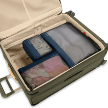 Load image into Gallery viewer, Briggs & Riley Check-In Packing Cube Set - Navy  
Image of Fully Packed Cubes shown inside of Checked Suitcase.
Small cube: 8.5 x 6.5 x 3 in / 21.6 x 16.5 x 7.6 cm
Medium cube: 13 x 8.5 x 3 in / 33 x 21.6 x 7.6 cm
Large cube: 17 x 13 x 3 in / 43.2 x 21.6 x 7.6 cm