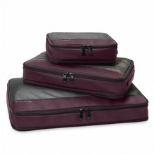 Load image into Gallery viewer, Briggs & Riley Check-In Packing Cube Set - Plum
Briggs & Riley Check-In Packing Cube Set shown in Plum and shown packed with clothing in stacked position from large to small
Small cube: 8.5 x 6.5 x 3 in / 21.6 x 16.5 x 7.6 cm
Medium cube: 13 x 8.5 x 3 in / 33 x 21.6 x 7.6 cm
Large cube: 17 x 13 x 3 in / 43.2 x 21.6 x 7.6 cm