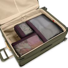 Load image into Gallery viewer, Briggs & Riley Check-In Packing Cube Set - Plum
Briggs & Riley Check-In Packing Cube Set shown in Plum and shown packed in checked suitcase
Small cube: 8.5 x 6.5 x 3 in / 21.6 x 16.5 x 7.6 cm
Medium cube: 13 x 8.5 x 3 in / 33 x 21.6 x 7.6 cm
Large cube: 17 x 13 x 3 in / 43.2 x 21.6 x 7.6 cm