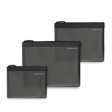 Load image into Gallery viewer, Briggs & Riley Translucent Pouch Set - Black
Image from bottom to top:  Small Pouch, Large Pouch and Medium Pouch
Small pouch: 8 x 6 x 1 in / 20.3 x 15.2 x 2.5 cm
Medium pouch: 10 x 7.5 x 1 in / 25.4 x 19.1 x 2.5 cm
Large pouch: 12 x 9 x 1 in / 30.5 x 22.9 x 2.5 cm