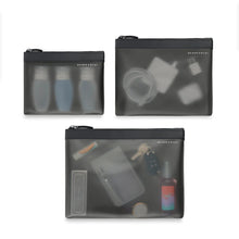 Load image into Gallery viewer, Briggs & Riley Translucent Pouch Set - Black
Shown packed with a variety of your favorite travel essentials, such as travel bottles, cables & chargers, lip balm, pen, keys, hand sanitizer, etc. (Contents not included)
Small pouch: 8 x 6 x 1 in / 20.3 x 15.2 x 2.5 cm
Medium pouch: 10 x 7.5 x 1 in / 25.4 x 19.1 x 2.5 cm
Large pouch: 12 x 9 x 1 in / 30.5 x 22.9 x 2.5 cm