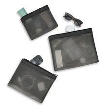 Load image into Gallery viewer, Briggs & Riley Translucent Pouch Set - Black
Alternate view of all three sized pouches packed with a variety of your favorite travel essentials (contents not included in purchase).
Small pouch: 8 x 6 x 1 in / 20.3 x 15.2 x 2.5 cm
Medium pouch: 10 x 7.5 x 1 in / 25.4 x 19.1 x 2.5 cm
Large pouch: 12 x 9 x 1 in / 30.5 x 22.9 x 2.5 cm