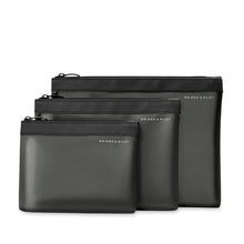 Load image into Gallery viewer, Briggs & Riley Translucent Pouch Set - Black
Pouches shown in graduating sizes from small to large in front panel view.
Small pouch: 8 x 6 x 1 in / 20.3 x 15.2 x 2.5 cm
Medium pouch: 10 x 7.5 x 1 in / 25.4 x 19.1 x 2.5 cm
Large pouch: 12 x 9 x 1 in / 30.5 x 22.9 x 2.5 cm