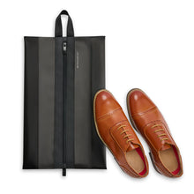Load image into Gallery viewer, Briggs & Riley Translucent Shoe Pouch
Fits up to US size 15 shoes or multiple smaller shoes. Shown with large men's dress shoes to visualize maximum capacity.
EXTERIOR DIMENSIONS:
17 x 10.5 in / 43.18 x 26.7 cm