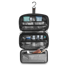 Load image into Gallery viewer, Briggs & Riley ZDX Hanging Toiletry Kit - Shown in Black
Shown in hanging position, with travel amenities (not included)
Dimensions: 10 x 5 x 2.8 inches