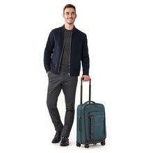 Load image into Gallery viewer, Briggs & Riley ZDX 22" Domestic Carry-On Expandable Spinner - Ocean Blue
Image of Bag in Front Angled View shown with Male Model.
Dimensions:  22 x 14 x 9"
Weight:           7.4 lbs.