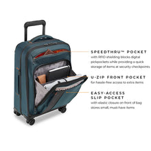 Load image into Gallery viewer, Briggs & Riley ZDX 22" Domestic Carry-On Expandable Spinner - Ocean Blue
Image of Briggs & Riley Product Feature Diagram illustrating the Speedthru Pocket with RFID shielding blocking digital pickpockets, U-Zip Front Pocket for hassle-free access to extra items and Easy-Access Slip Pocket to store small must-have items.
Dimensions:  22 x 14 x 9"
Weight:           7.4 lbs.