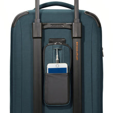 Load image into Gallery viewer, Briggs & Riley ZDX 22" Domestic Carry-On Expandable Spinner - Ocean Blue
Image of Briggs & Riley Power Pocket which allows space for power bank charger and smart phone, should you wish to charge your phone on the go.
Dimensions:  22 x 14 x 9"
Weight:           7.4 lbs.
