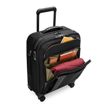 Load image into Gallery viewer, full angled view of the front compartments open of the black Briggs & Riley Global 21" Carry-on Expandable Spinner