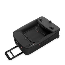 Load image into Gallery viewer, Angled view of the black duffle bag with the top portion collapsed into itself.