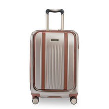 Load image into Gallery viewer, Front panel view of the beige suitcase with the telescopic handle extended.