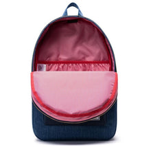 Load image into Gallery viewer, Front interior view of the faded dark denim backpack. The interior lining is a pattern of vertical red and white lines.
