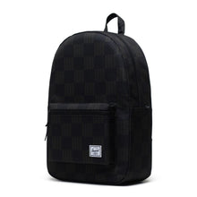 Load image into Gallery viewer, Angled front view of the black checkered settlement backpack.