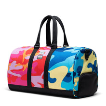 Load image into Gallery viewer, Herschel Supply Co. Novel Duffle - Andy Warhol Pink/Blue Camo Print