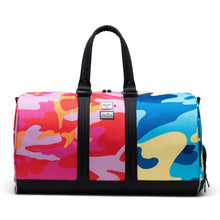 Load image into Gallery viewer, Herschel Supply Co. Novel Duffle - Andy Warhol Pink/Blue Camo Print