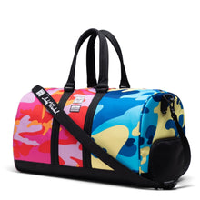 Load image into Gallery viewer, Herschel Supply Co. Novel Duffle - Andy Warhol Pink/Blue Camo Print