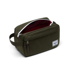 Load image into Gallery viewer, Angled view of the Ivy Green Chapter Travel Kit. The main compartment is unzipped.