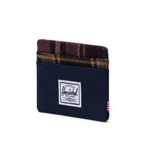 Load image into Gallery viewer, Angled view of the navy blue and yellow with red plaid wallet.