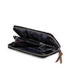 Load image into Gallery viewer, Angled interior view of the Thomas wallet in Black Palm.The main compartment is unzipped.