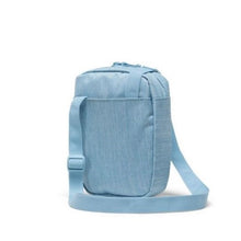 Load image into Gallery viewer, Angled view of the back of the blue bag.
