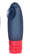 Load image into Gallery viewer, Angled view of the navy blue travel bottle with a red cap.