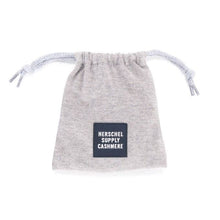 Load image into Gallery viewer, Front view of the light gray cashmere storage bag or the eye mask.