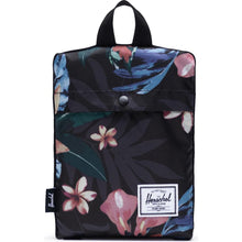 Load image into Gallery viewer, The Summer Floral Black packable daypack folded in the storage pouch