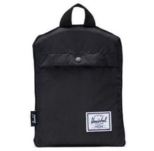Load image into Gallery viewer, The black packable duffle folded into its pocket.