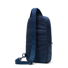 Load image into Gallery viewer, Angled back panel view of the Indigo Crosshatch Cross body bag