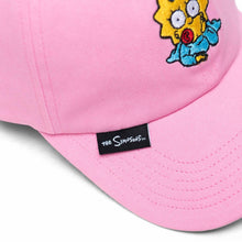 Load image into Gallery viewer, Close up to the black Simpsons logo tag sown on the front of the cap.
