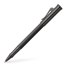 Load image into Gallery viewer, Side view of the black guilloche rollerball pen with the cap posted.