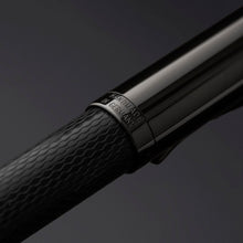 Load image into Gallery viewer, Angled close up to the cap with engraved text: HANDMADE IN GERMANY.